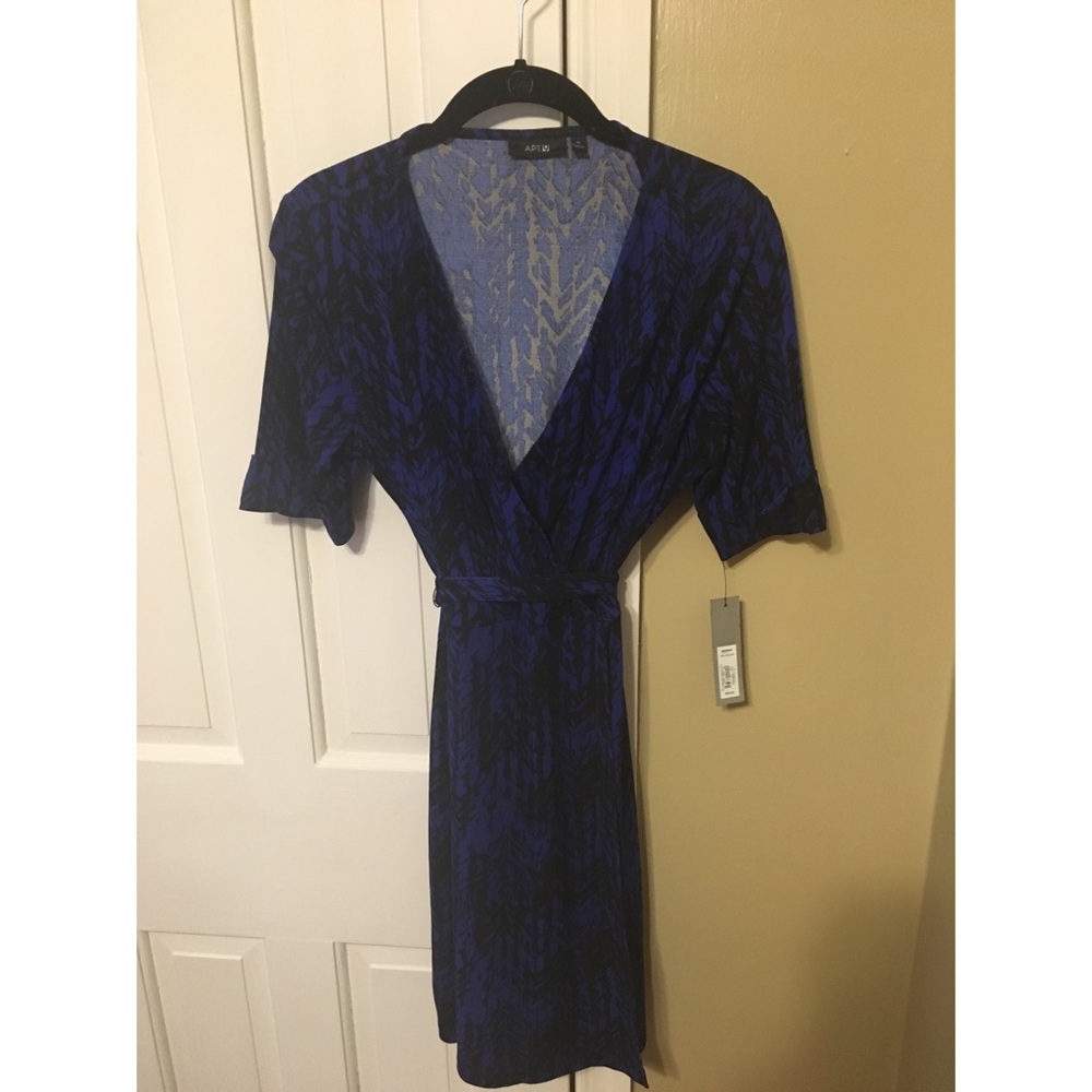 Dark and light blue patterned dress with tie.